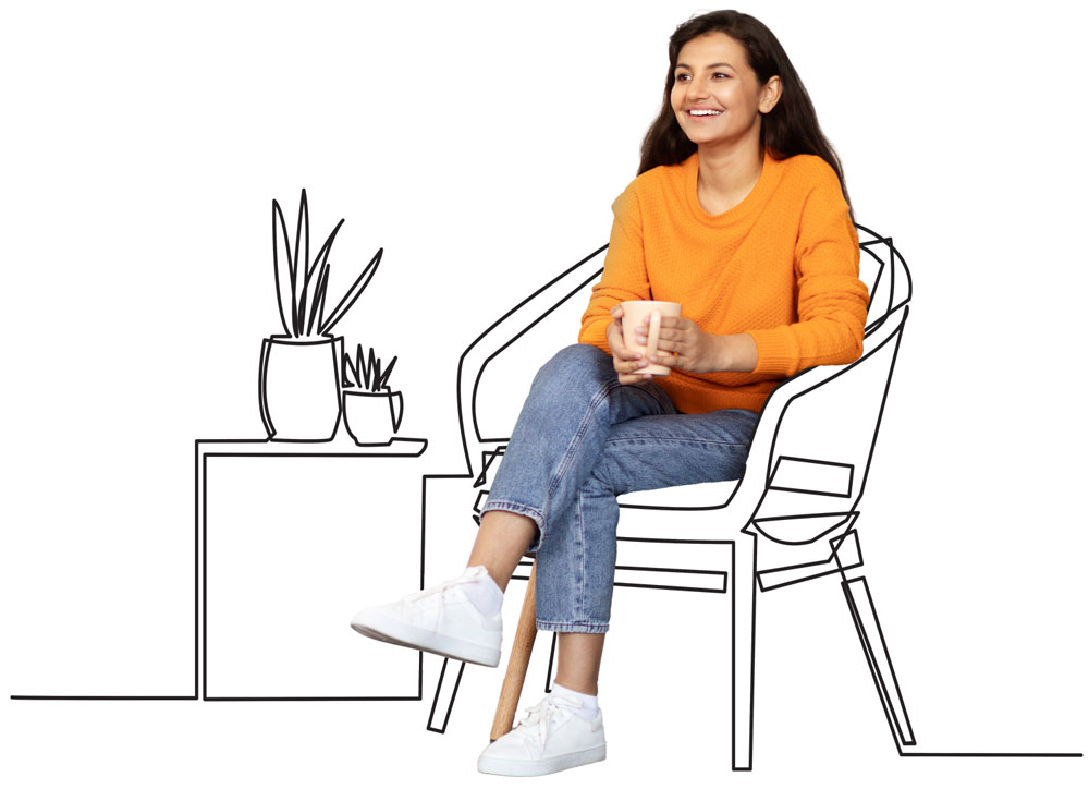 Positive young eastern woman sitting on illustrated armchair